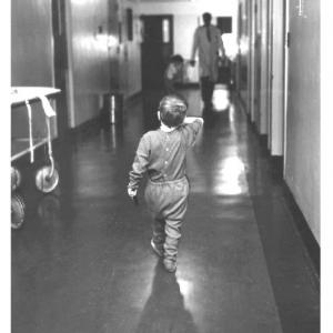 Richard Scott in a hallway, 1958