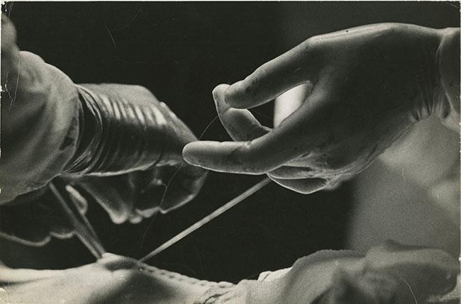 Image: The hands of Drs. Milton Porter and Robert H. Elliott during surgery, 1963